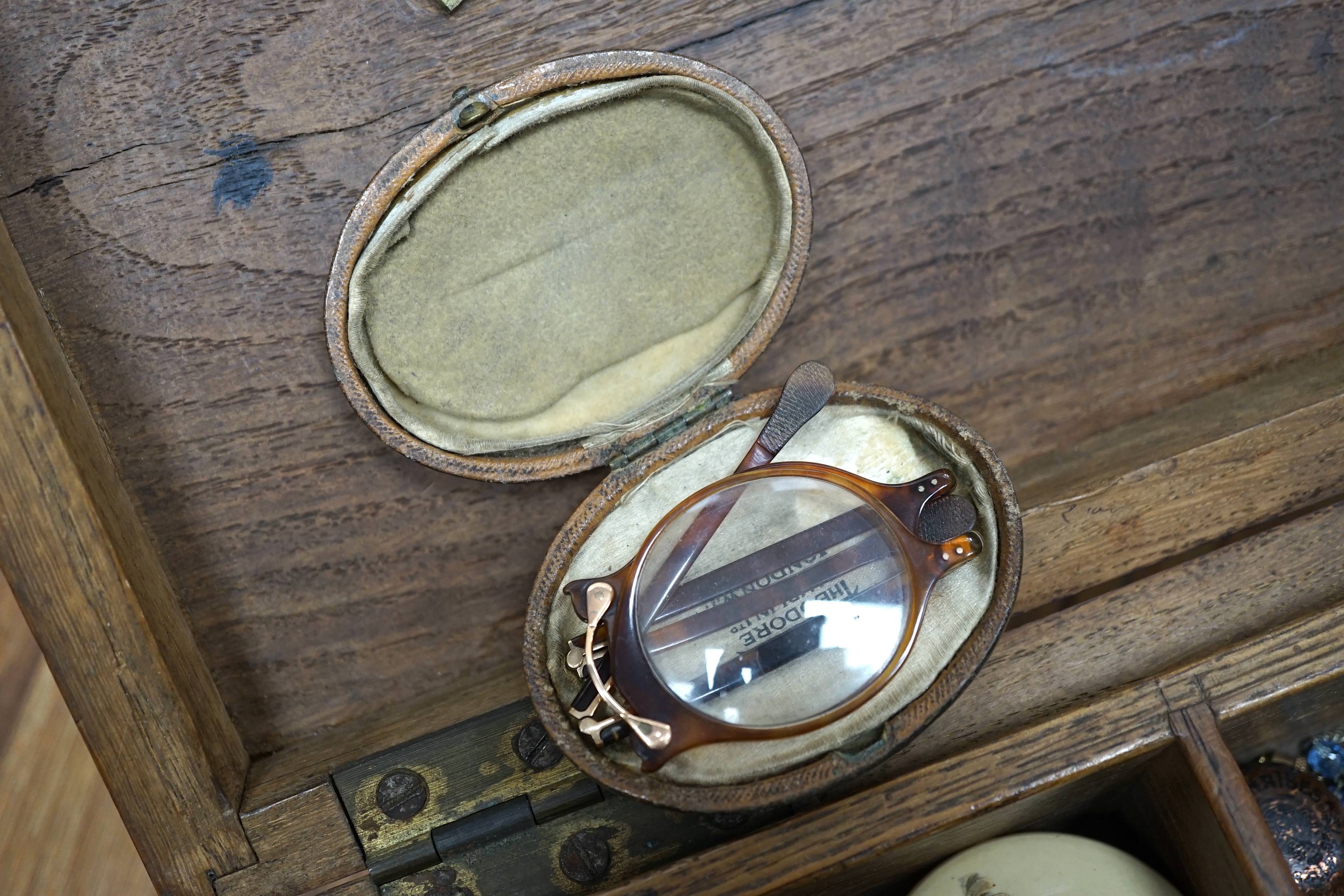 A quantity of assorted 19th century and mainly later costume jewellery and other items including folding tortoiseshell lorgnettes, antimony box, fob seal, silver and hardstone anchor brooch, white metal and enamel rings,